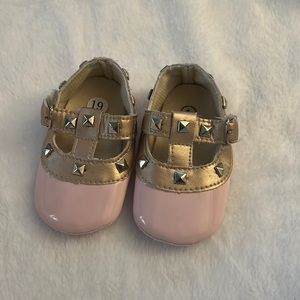 Pink size 1 baby shoe